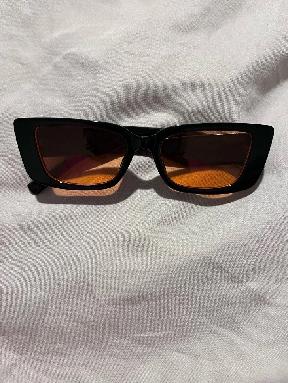 Black Cat-Eye Sunglasses with Amber Lenses